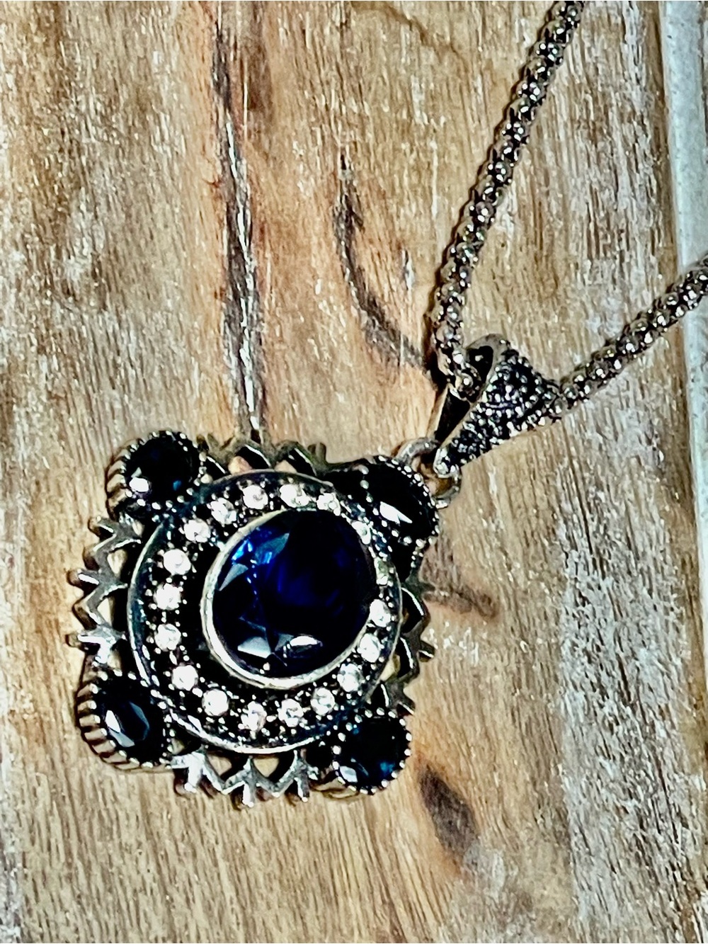 Silver-Tone Necklace with Deep Blue Crystal Pendant